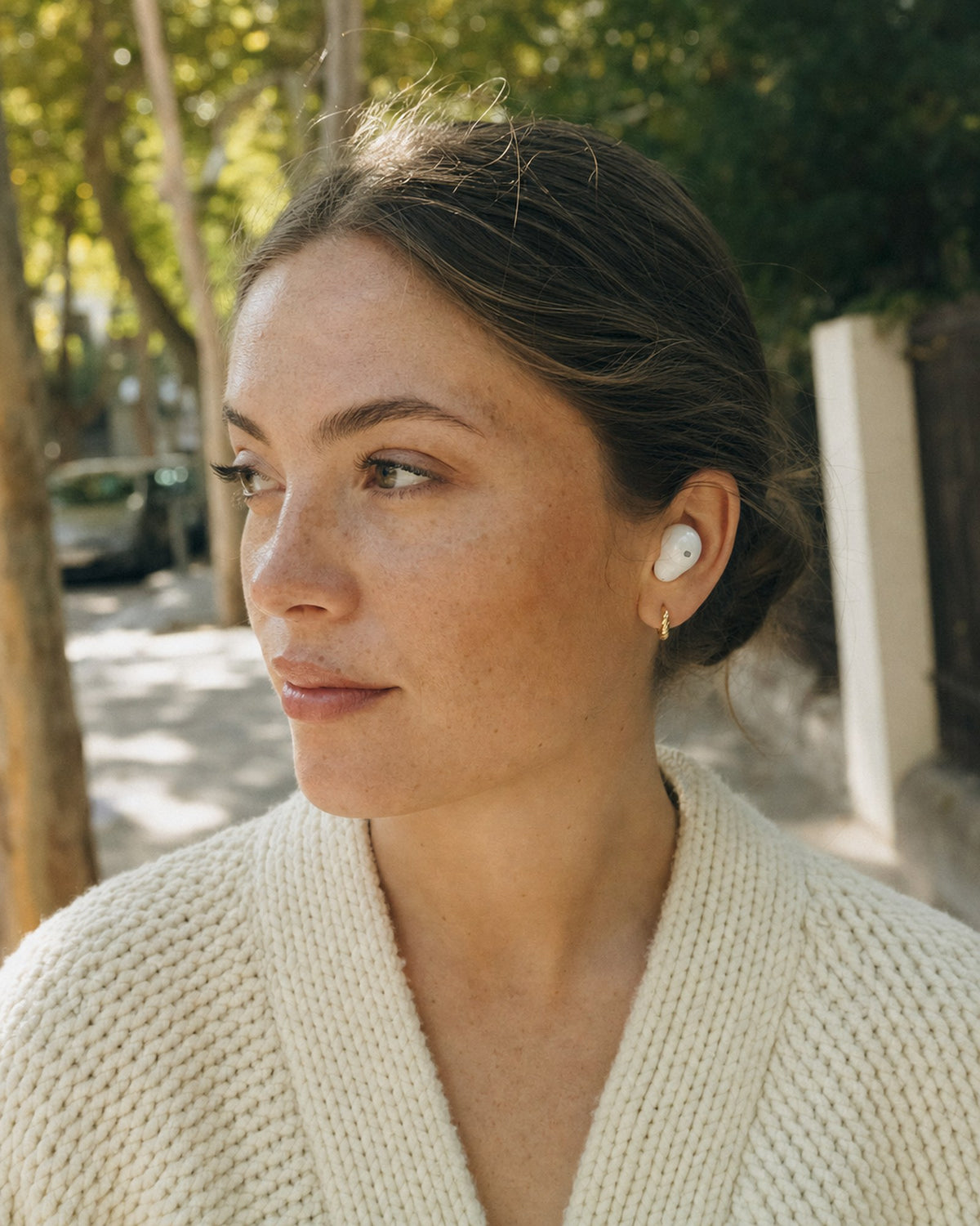 Pearl Wireless Earbuds styled and in use